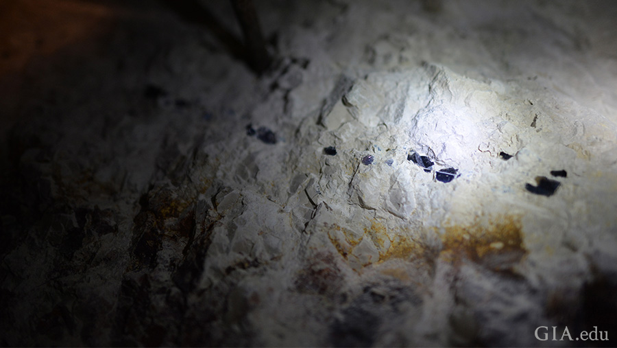 Black opal nodules are sometimes found in a line, as you can see in this photo from the Lightning Ridge mine. Photo: Vincent Pardieu