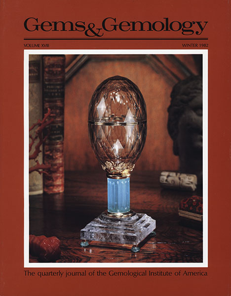 Figure 3. The Winter 1982 cover depicts a quartz egg with an aquamarine and quartz base carved by Harold Van Pelt. The issue also includes an article detailing the techniques and equipment Van used to fashion the egg. Photo by Harold & Erica Van Pelt.