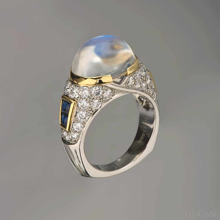 The 8.34 ct moonstone in this ring designed by Maria Canale is set in platinum with sapphires. Courtesy: Richard Krementz Gemstones. Photo: Robert Weldon/GIA