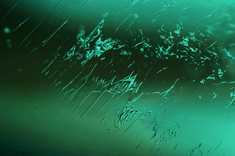 Three-phase inclusions in the emerald lenses. Three-phase inclusions in the emerald lenses.