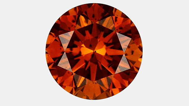 Irradiated 1.06 ct brownish orange HPHT synthetic diamond