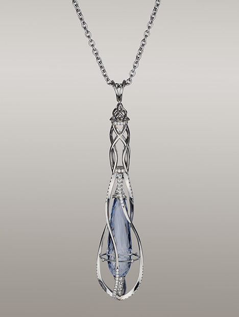 Jeffrey Bilgore pendant inspired by The Lord of the Rings, featuring blue sapphire and diamonds. Jeffrey Bilgore pendant inspired by The Lord of the Rings, featuring blue sapphire and diamonds.
