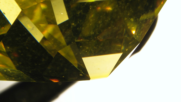 Color concentration along a diamond’s culet, evidence of irradiation
