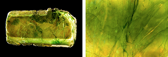 Green sapphire rough treated with a green lead-glass filling