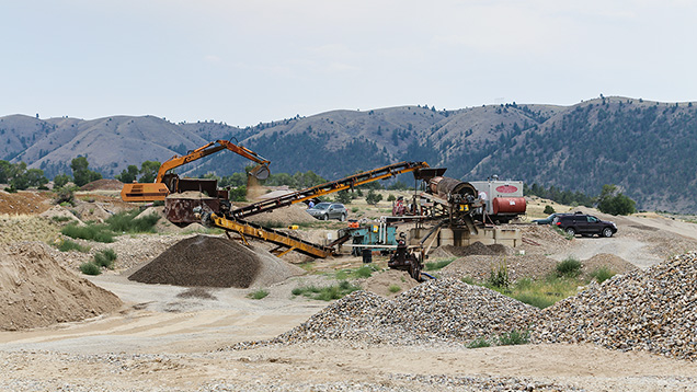 Equipment and piles of stones