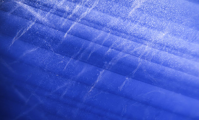 The Kashmir star sapphire contains wispy stringers and milky particle bands.