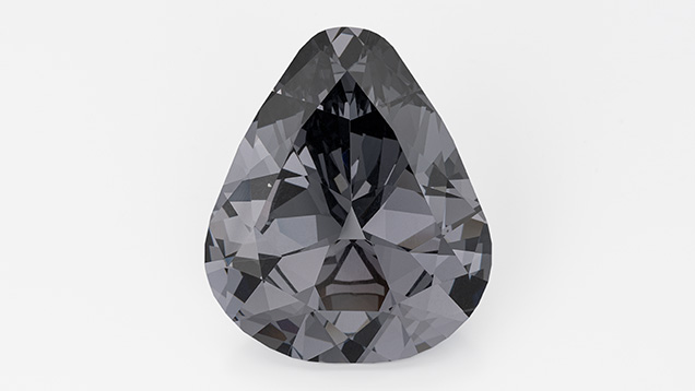 A 11.78 ct antique pear shape gray spinel cut by David Nassi.