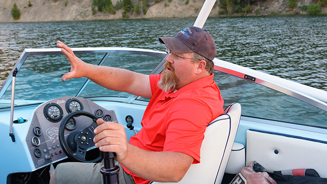Man on boat talking