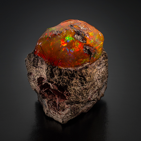 Mexican opal in rhyolite, from the collection of the Mineralogical and Geological Museum at Harvard University.