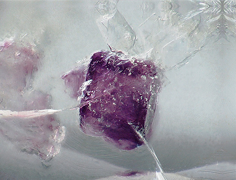 Purple fluorite cube inclusion in a hyalite.