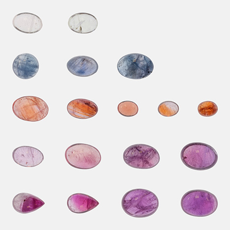 Figure 1. Part of the suite of sapphires studied for this project (weighing 0.23–1.41 ct). Photo by Sasithorn Engniwat; courtesy of Greenland Ruby.