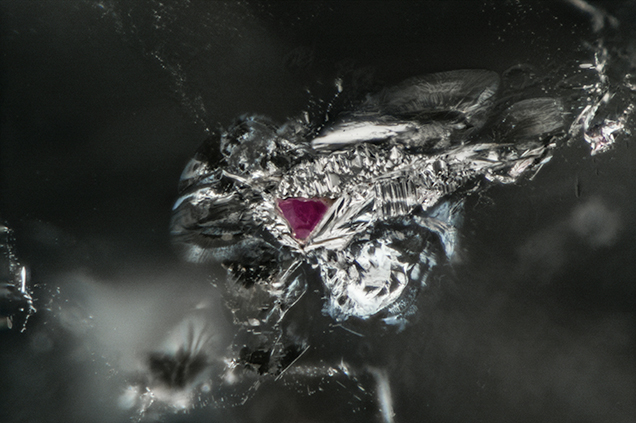 Red heart-shaped pyrope inclusion in diamond.