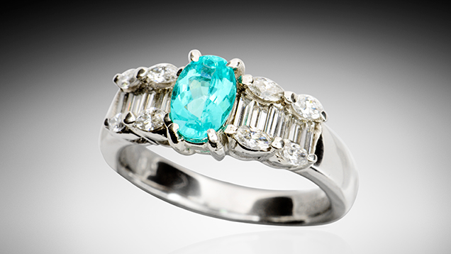Paraíba tourmaline with coating.