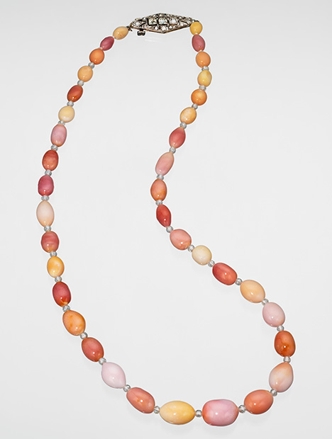 Figure 1. Necklace featuring 37 conch pearls accented by 32 diamonds. Photo by Robert Weldon; courtesy of Aloha Pearls Hawaii.