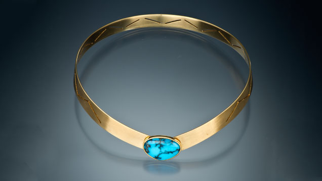 18-karat Gold Collar with Turquoise Cabochon. This 18-karat gold collar, designed by Pierre Touraine, is set with a turquoise cabochon of fine texture and color. - Gift of Touraine Family Trust