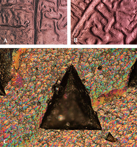 Channels on the surface of a “color-change” pyrope garnet rough under diffused reflected lighting