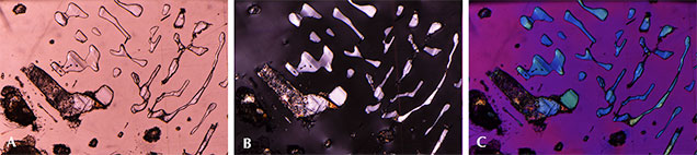 Partially healed fingerprint-like inclusions in “color-change” pyrope garnet