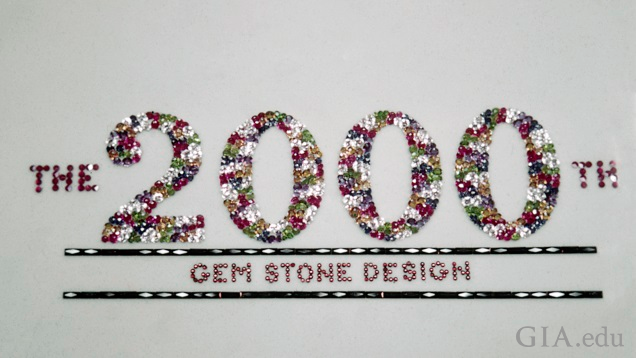 The gems spell out “The 2000th Gem Stone Design.”