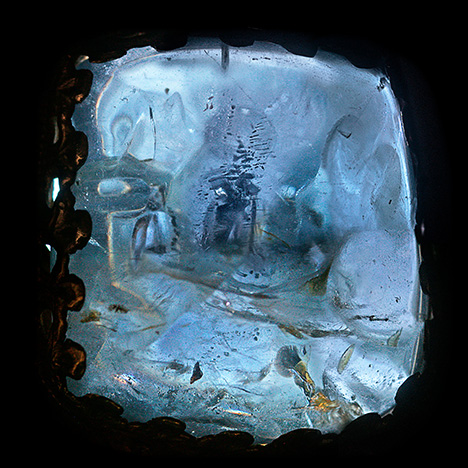 Composite image of the large center sapphire on the back of the reliquary. Composite image of the large center sapphire on the back of the reliquary.