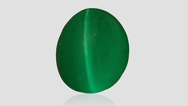 Large Brazilian cat’s-eye emerald. Large Brazilian cat’s-eye emerald.