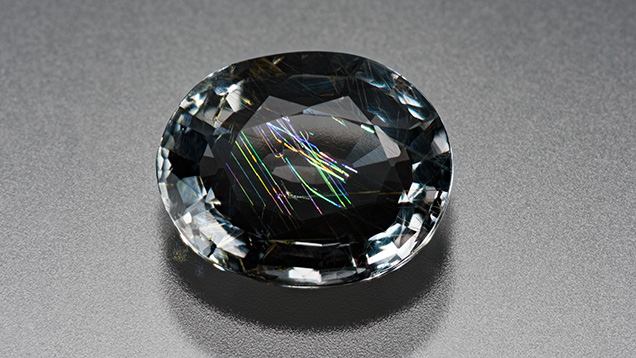 Gray musgravite displaying iridescence. Gray musgravite displaying iridescence.