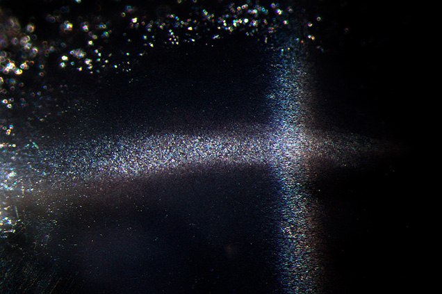 When viewed in a different position, the spinel also displays a four-rayed star. When viewed in a different position, the spinel also displays a four-rayed star.