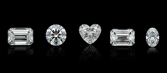 Figure 18. Large laboratory-grown diamonds such as these CVD-grown diamonds have become increasingly common the last few years. From left: a 12.06 ct G-color, VS2 emerald cut; an 11.36 ct E-color, SI1 round brilliant; a 10.42 ct G-color, VS2 heart brilliant; a 10.19 ct F-color, VS2 emerald cut; and a 9.52 ct E-color, VS2 oval brilliant. Photos by Gaurav Bera.