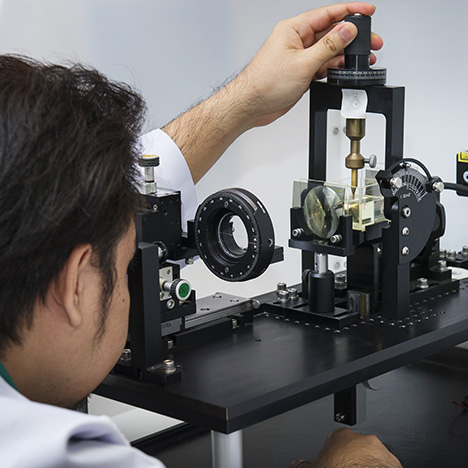 Gemologists use a custom-built instrument to align samples along their c-axis
