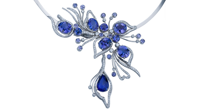 In this image, the tanzanite centerpiece is positioned in such a way to call immediate attention to the picture. The plain platinum necklace behind is not important enough to show it in its entirety. In this image, the tanzanite centerpiece is positioned in such a way to call immediate attention to the picture. The plain platinum necklace behind is not important enough to show it in its entirety. Courtesy of the Tanzanite Foundation. In this image, the tanzanite centerpiece is positioned in such a way to call immediate attention to the picture. The plain platinum necklace behind is not important enough to show it in its entirety. In this image, the tanzanite centerpiece is positioned in such a way to call immediate attention to the picture. The plain platinum necklace behind is not important enough to show it in its entirety. Courtesy of the Tanzanite Foundation.