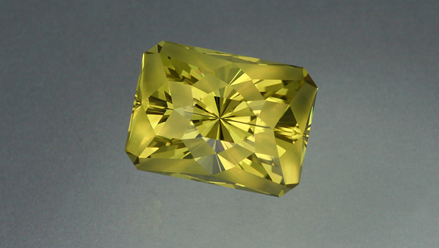 Lime-colored citrine can result from heat treatment of smoky quartz. The gem’s designer used some frosted facets to highlight its trendy color. – Lydia Dyer, gem courtesy John Dyer & Co