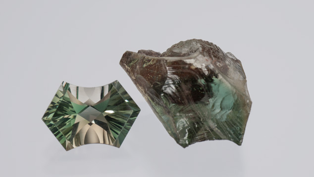 The 2.40-ct. faceted bicolor gem displays an unusual green and yellow combination. Gem cutters seek ways to display unusual colors from rough like the 9.36-ct. specimen. – Robert Weldon