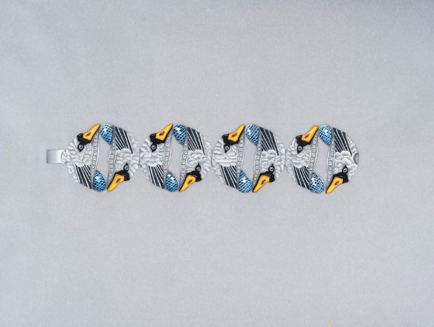 2022 Winner Design by Sara Guergova, a graduate of the GIA Jewelry Design course in London, UK – “Swans represent togetherness and loyalty, and during the time of designing this bracelet, I felt those themes needed to shown the most.”. The bracelet design features gold, diamond, ruby, sapphire, tourmaline, onyx and enamel.