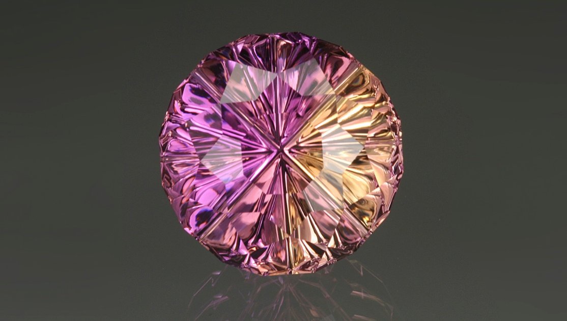 宝石设计师 John Dyer 的 Starbrite ™ 切割令双色紫黄晶呈现最佳效果，使两种主色之间差异细微。 – Lydia Dyer（宝石由 John Dyer & Co. 提供）