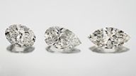Figure 1. Oval-, pear-, and marquise-shaped diamonds show more complex appearance patterns than standard round brilliants. Photos by Jian Xin (Jae) Liao.